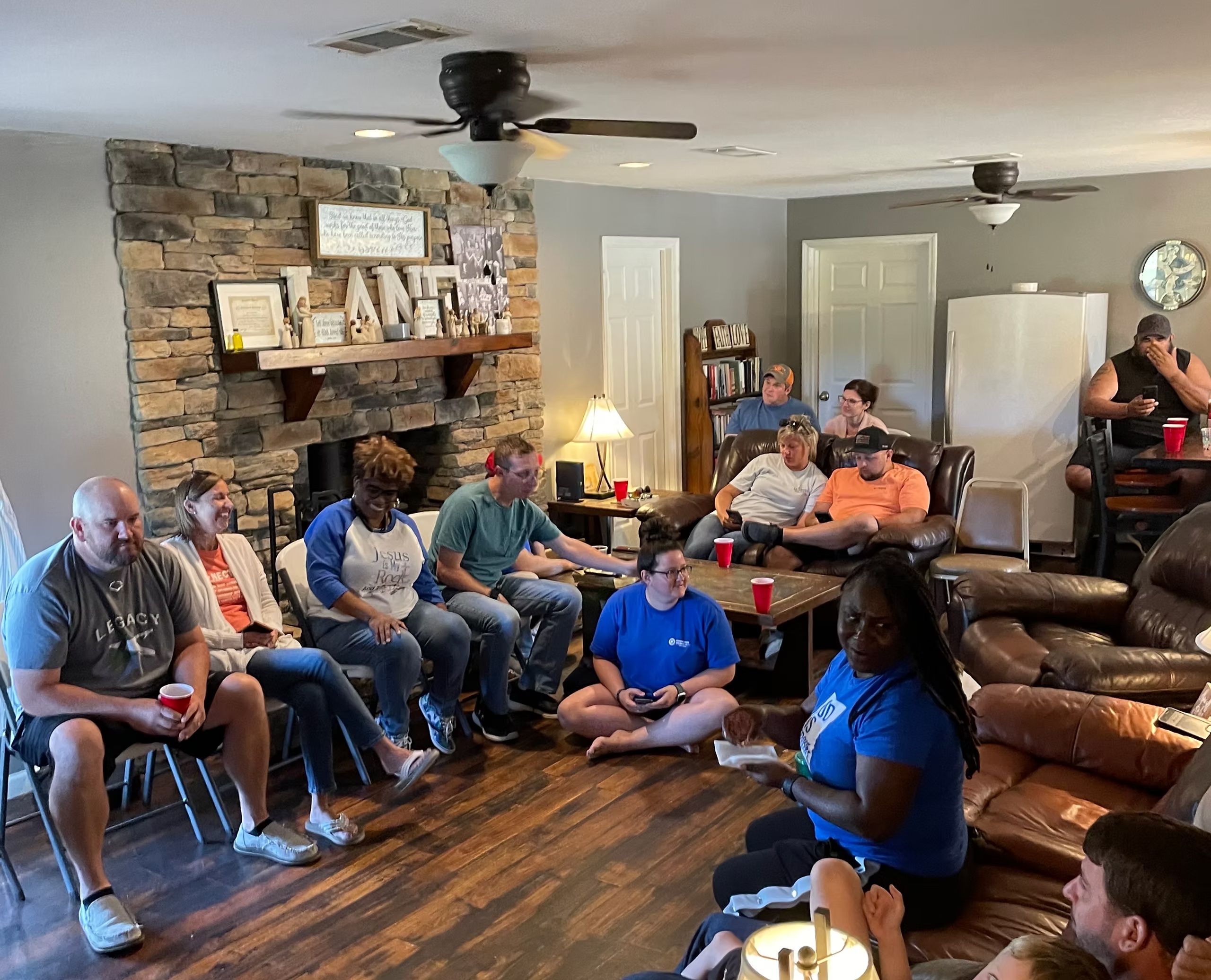 People gathered in a living room at Connection Church Wilco